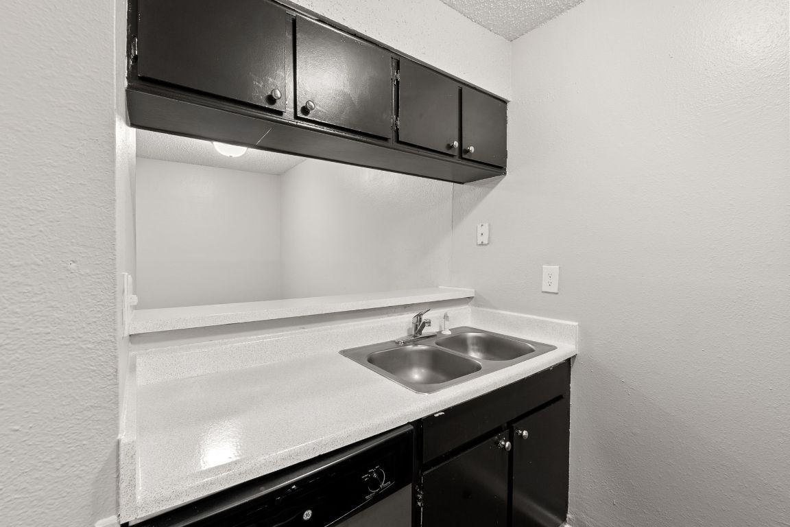 2001 South Interstate 35 Frontage Road, Unit 101 Austin, TX 78741 - Photo 5 of 24 a sink with a microwave