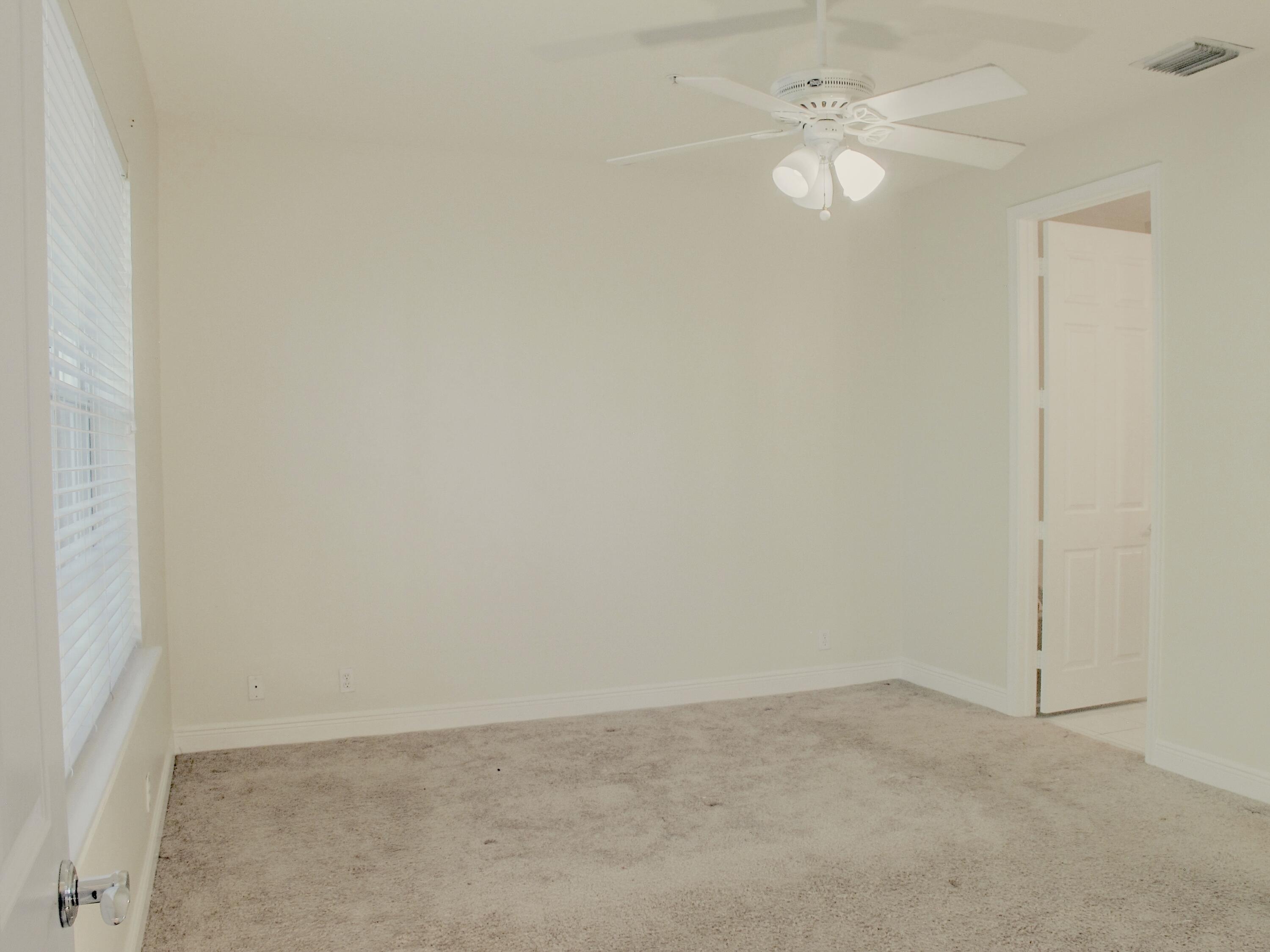 124 Jesup Lane Jupiter, FL 33458 - Photo 23 of 25 Primary Bedroom