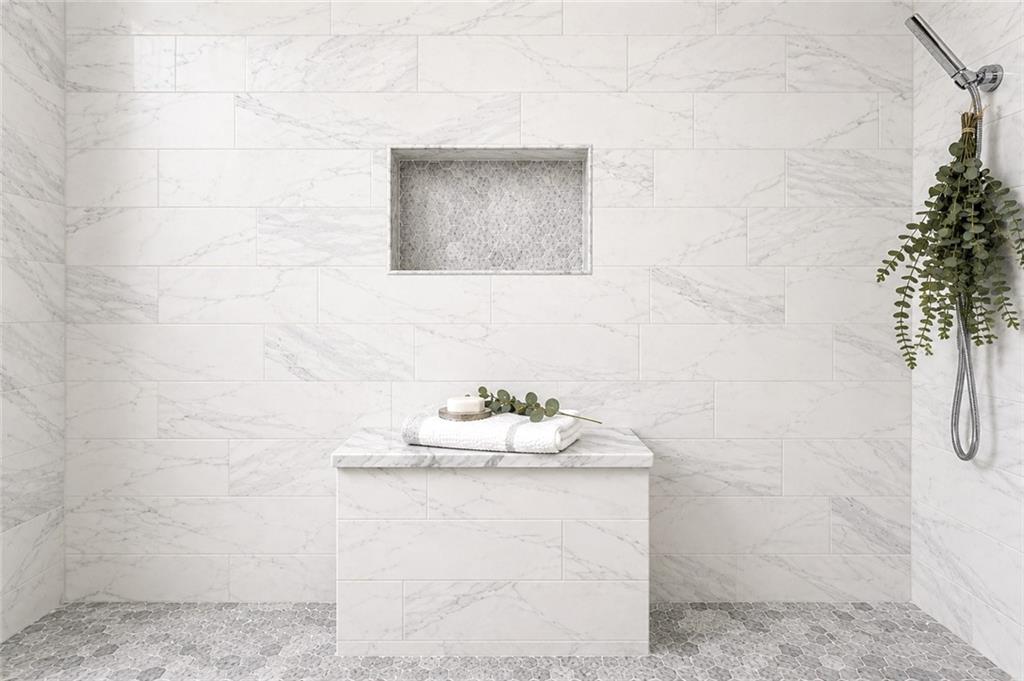 3300 Windy Ridge Parkway Southeast, Unit 1112 Atlanta, GA 30339 - Photo 16 of 43 a bathroom with a shower