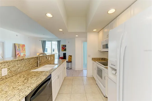 a bathroom with a shower a toilet and a sink
