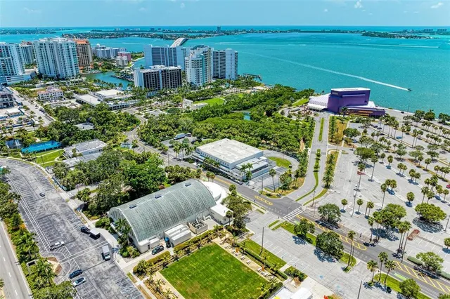 a view of a city with an ocean view
