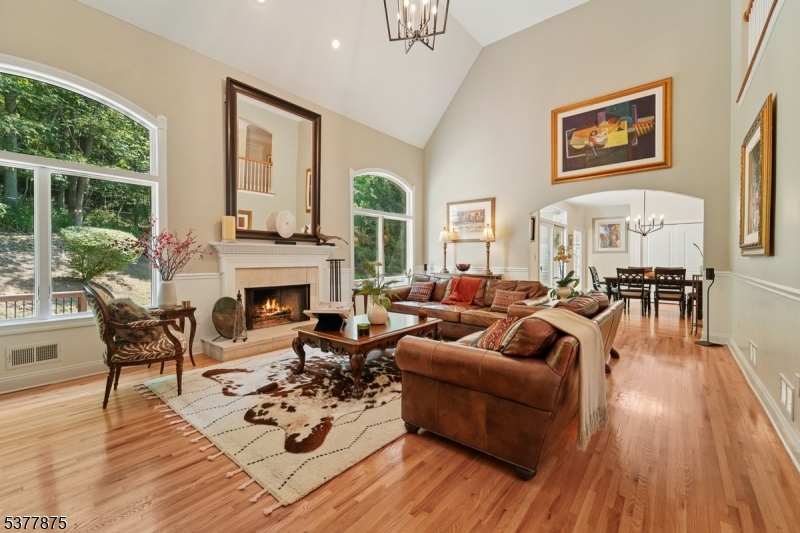 14 Broadway Road Warren, NJ 07059 - Photo 12 of 45 a living room with furniture and a fireplace