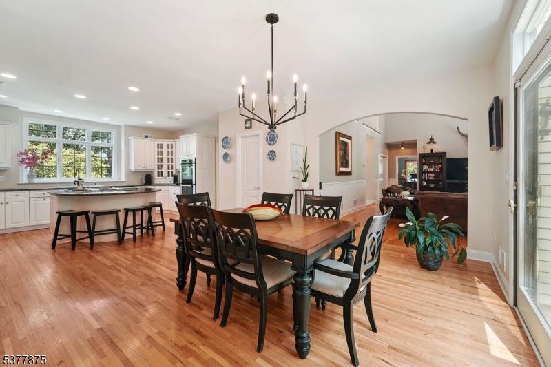 14 Broadway Road Warren, NJ 07059 - Photo 16 of 45 a dining room with furniture and wooden floor