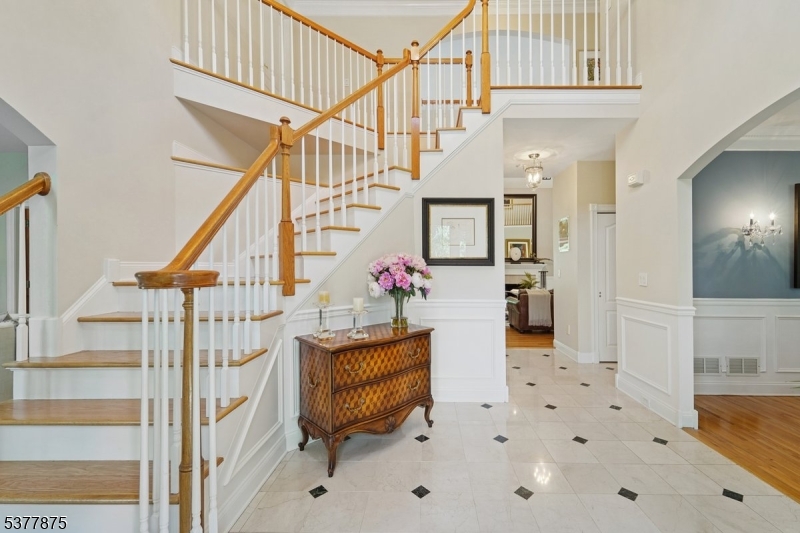 14 Broadway Road Warren, NJ 07059 - Photo 5 of 45 a view of entryway dining room and hall with wooden floor