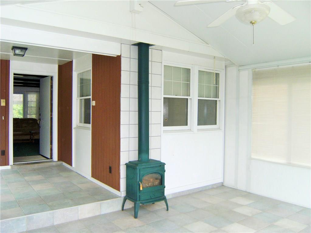 1746 Locust Road Sewickley, PA 15143 - Photo 6 of 25 Sun Room Looking Into Entry Showing Thermostat Controlled Gas Stove