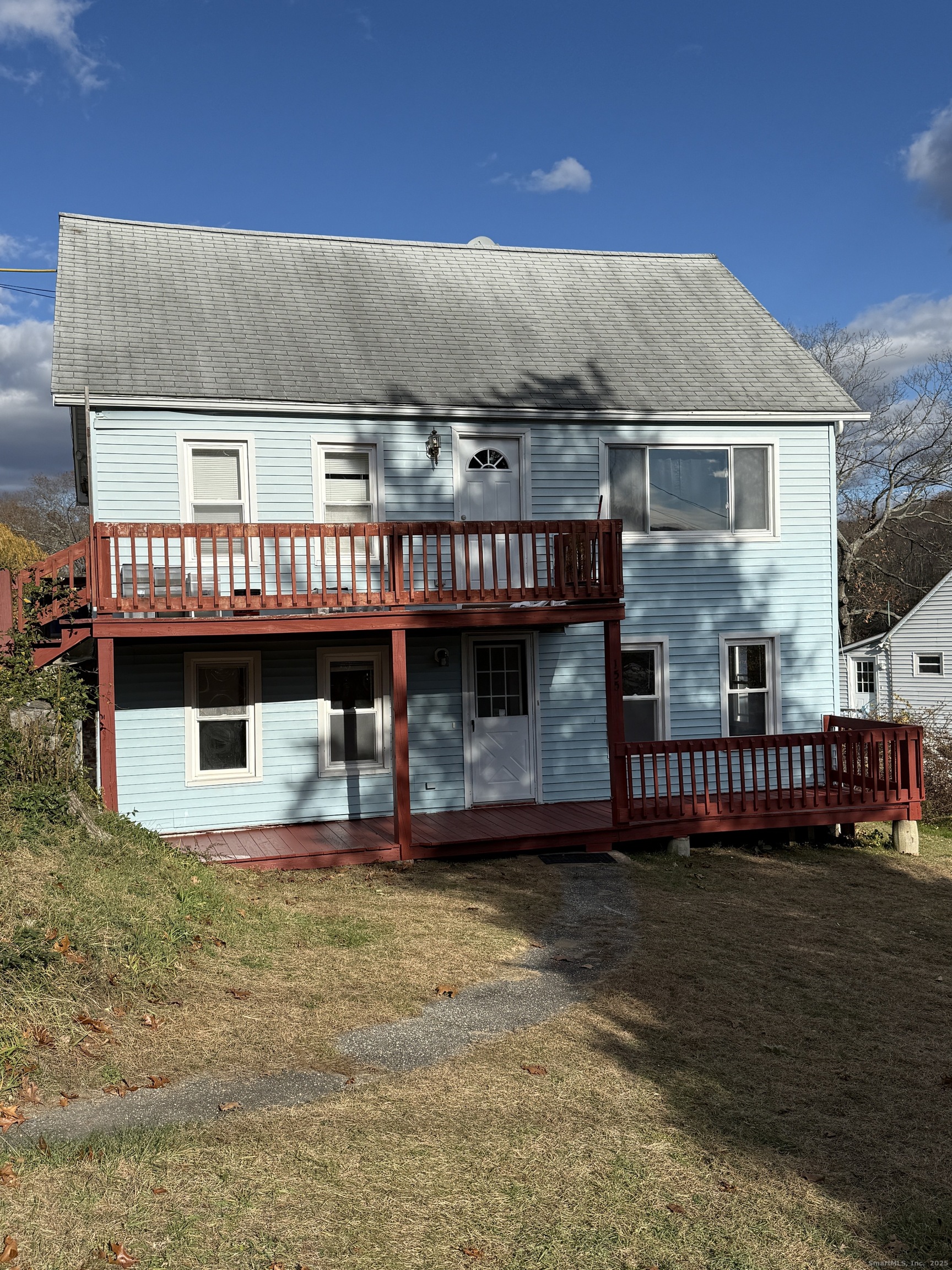 a view of house with swimming pool