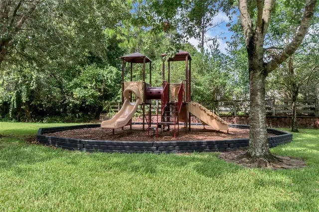 a view of a garden with a slide