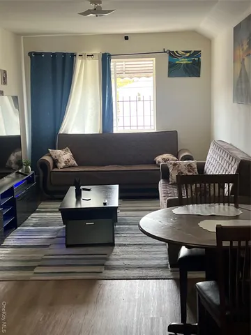 a bedroom with a bed and a closet