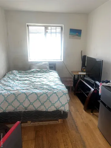 a kitchen with a cabinets and white appliances