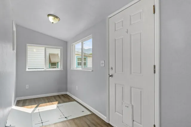 a view of storage and utility room with washer and dryer