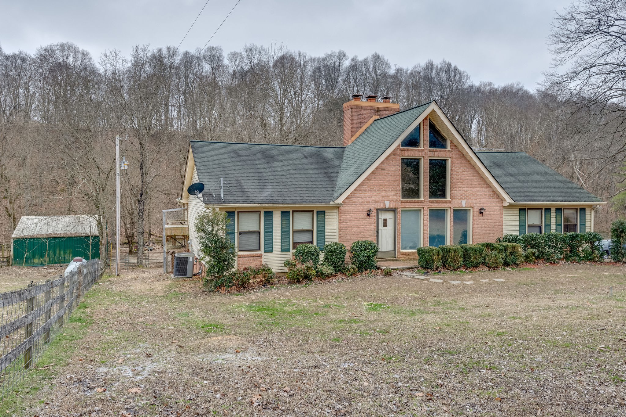 3851 Martins Chapel Road Springfield, TN 37172 - Photo 3 of 37 a view of a white house next to a yard with large trees