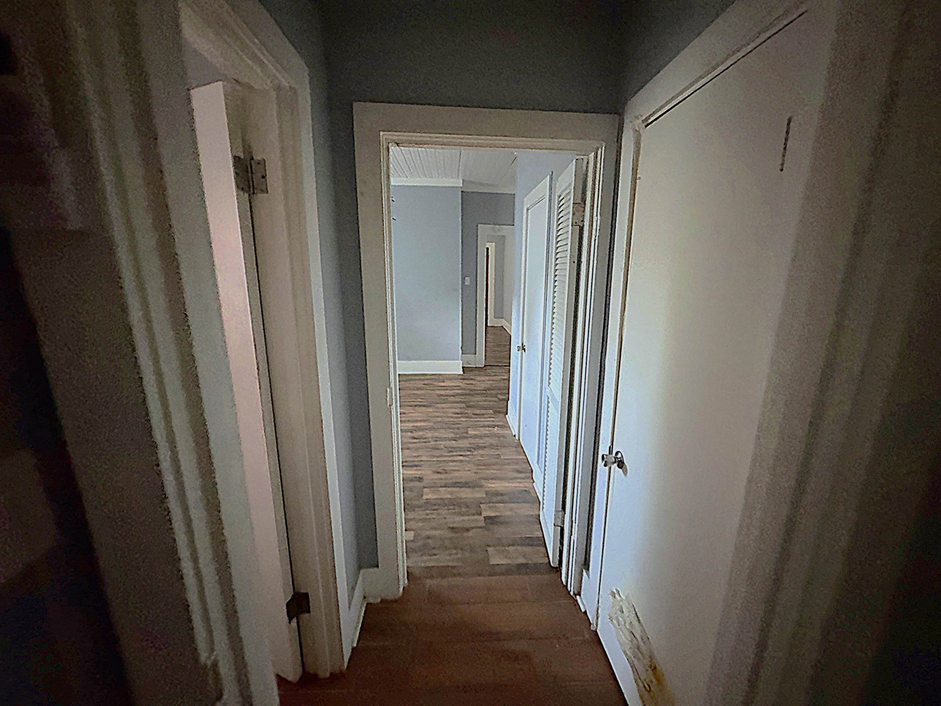 767 Semmes Street Memphis, TN 38111 - Photo 17 of 23 a view of a hallway with wooden floor