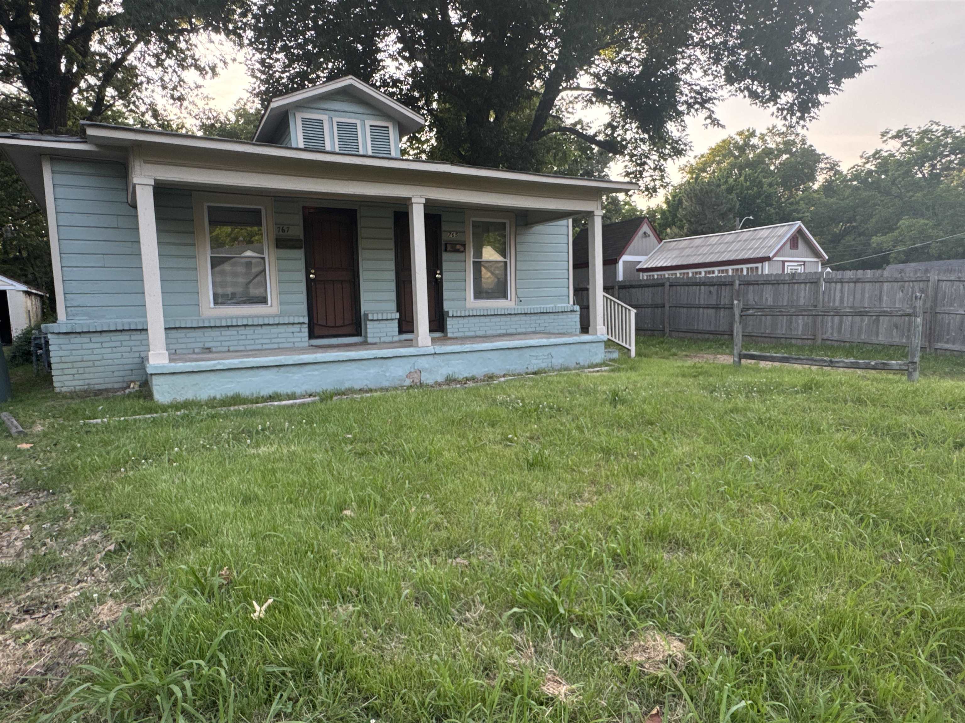 767 Semmes Street Memphis, TN 38111 - Photo 3 of 23 a view of house with a yard