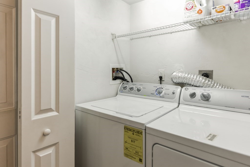 27 Honeysuckle Road Worcester, MA 01607 - Photo 21 of 30 a utility room with dryer and washer