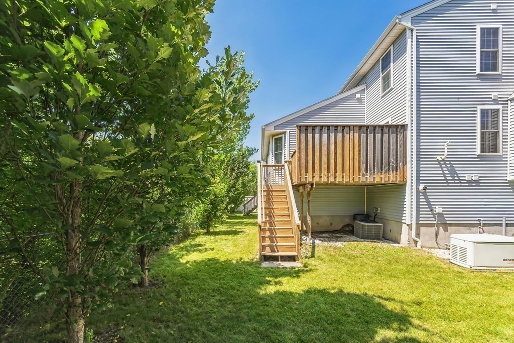 27 Honeysuckle Road Worcester, MA 01607 - Photo 25 of 30 a view of a house with a backyard