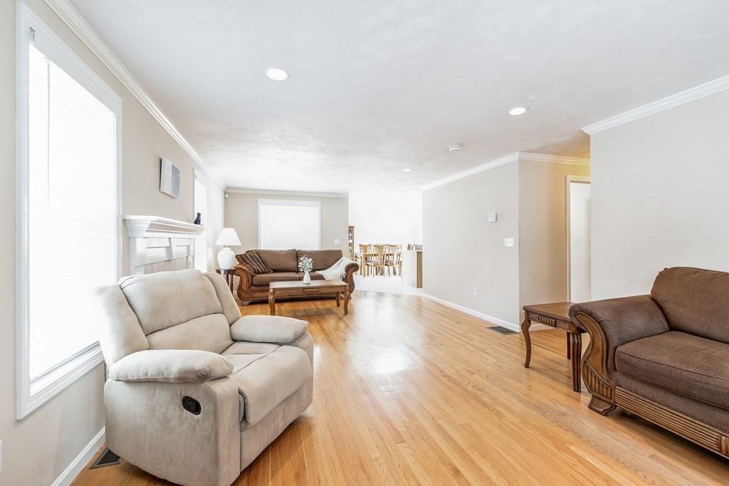 27 Honeysuckle Road Worcester, MA 01607 - Photo 7 of 30 a living room with furniture and a wooden floor