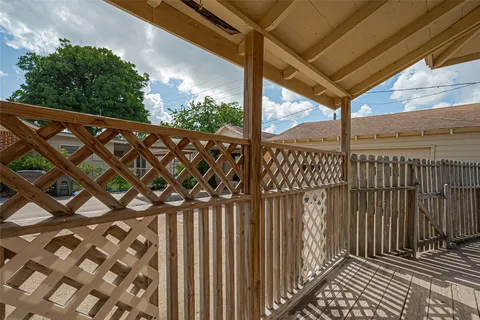 a view of a wooden fence