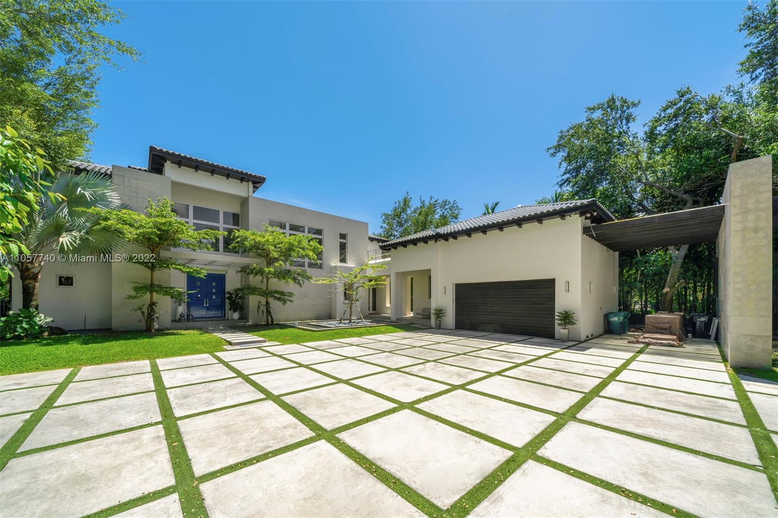 5030 Davis Road Miami, FL 33143 - Photo 25 of 29 a view of a house with a patio