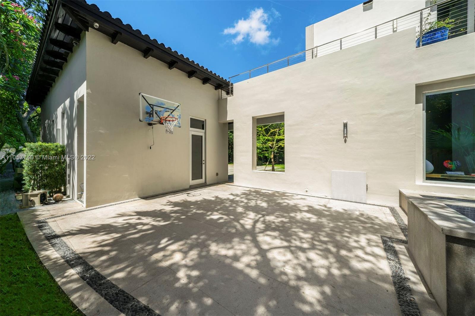 5030 Davis Road Miami, FL 33143 - Photo 29 of 29 a view of a house with a backyard and balcony