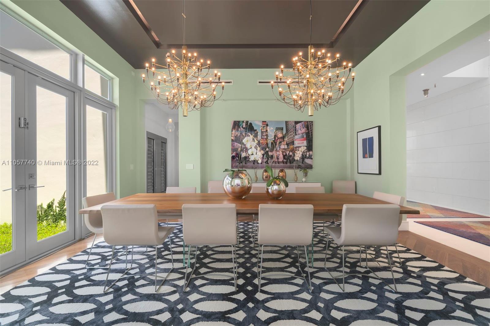 5030 Davis Road Miami, FL 33143 - Photo 5 of 29 a living room with a large window and chandelier