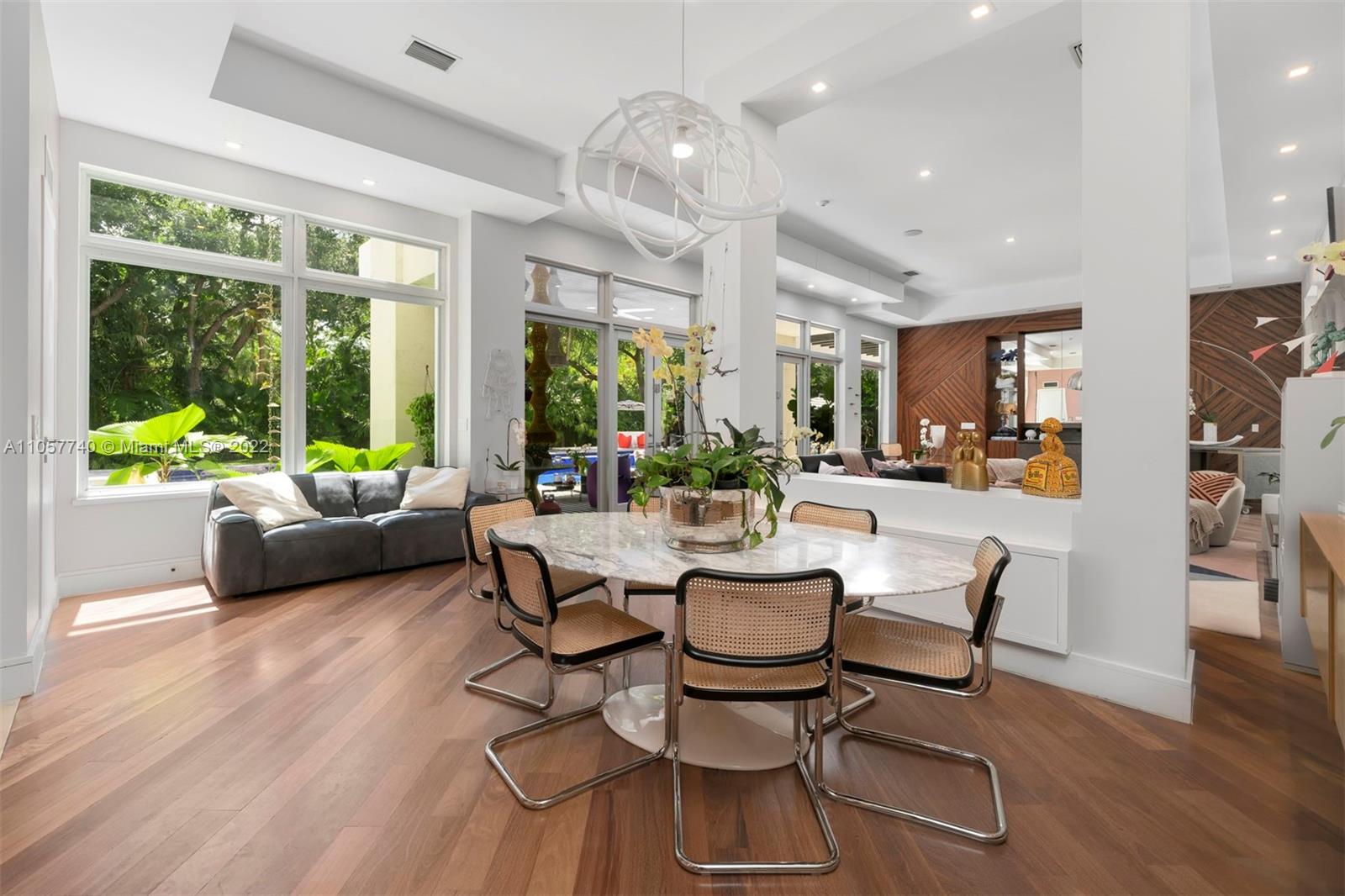 5030 Davis Road Miami, FL 33143 - Photo 8 of 29 a view of a dining room with furniture window and wooden floor