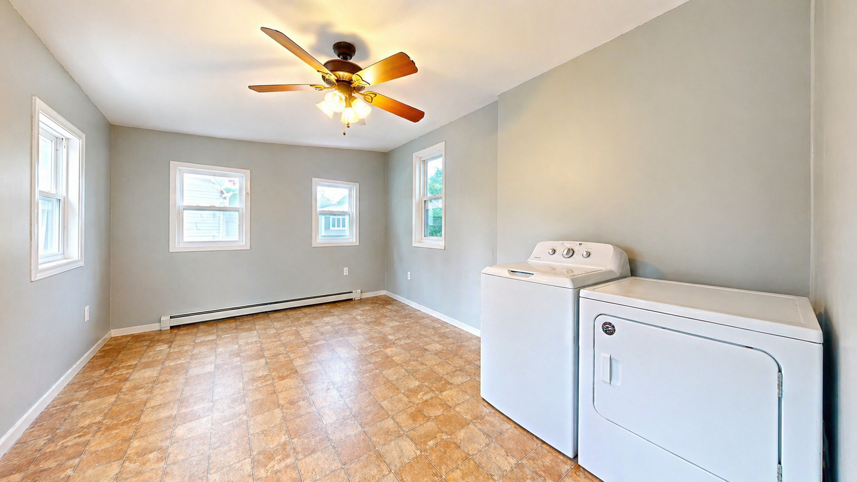 829 East Old Rte 47 Monticello, IL 61856 - Photo 11 of 16 a view of a livingroom with a washer and dryer