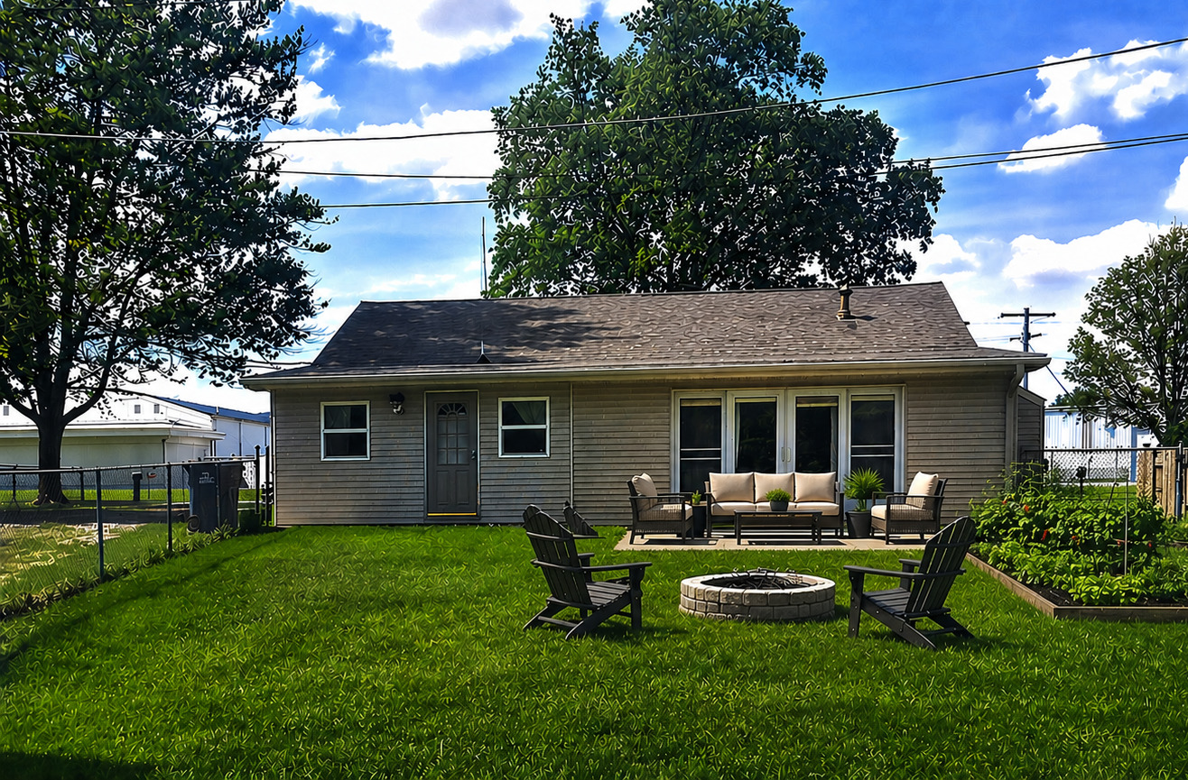 829 East Old Rte 47 Monticello, IL 61856 - Photo 13 of 16 a front view of house with a garden and patio