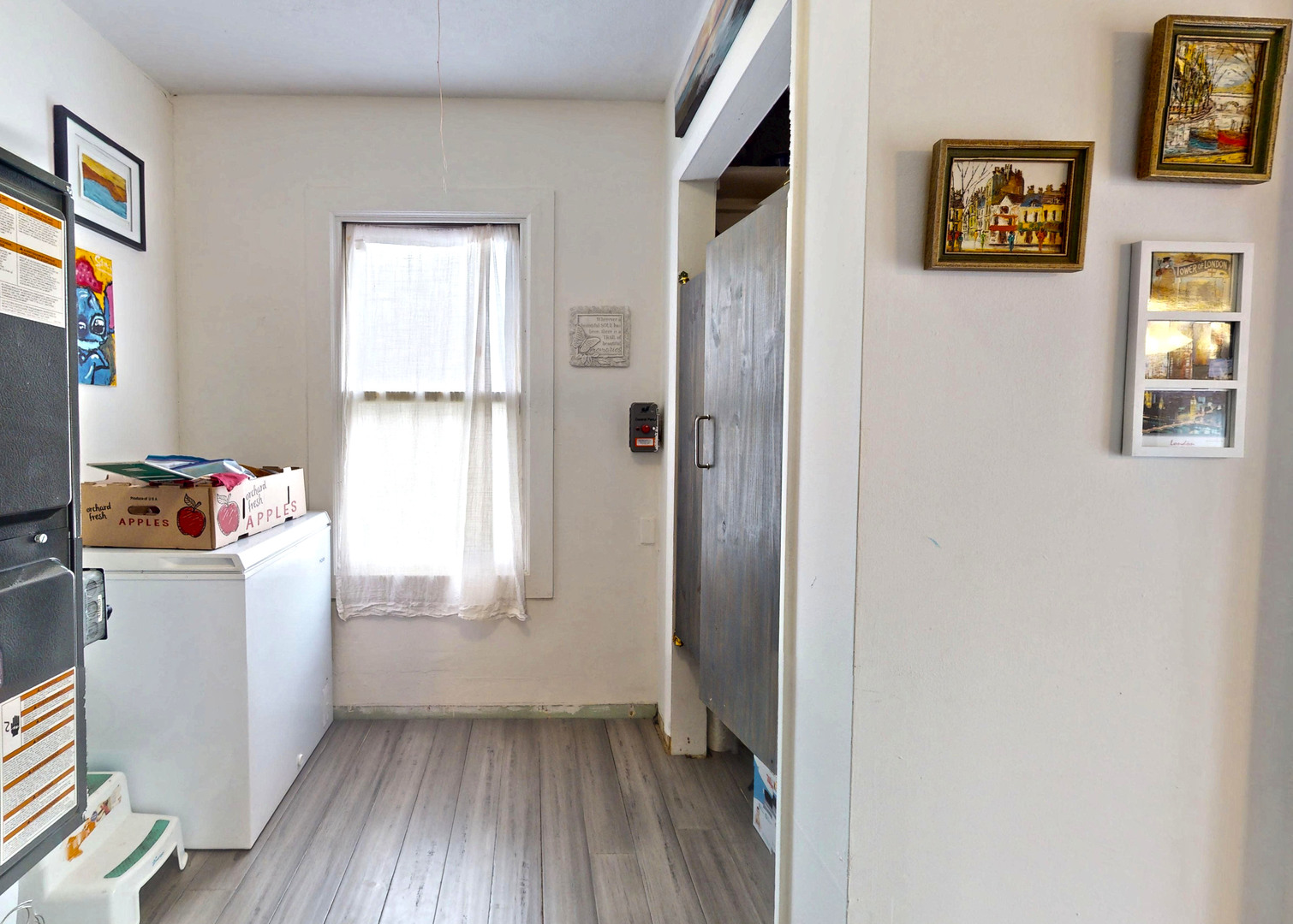 829 East Old Rte 47 Monticello, IL 61856 - Photo 10 of 16 a view of a hallway with wooden floor and a workspace