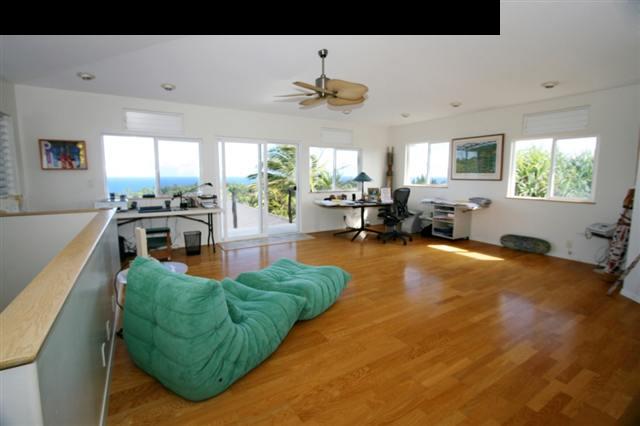 111 Door Of Faith Road Haiku, HI 96708 - Photo 16 of 23 a living room with furniture and a large window