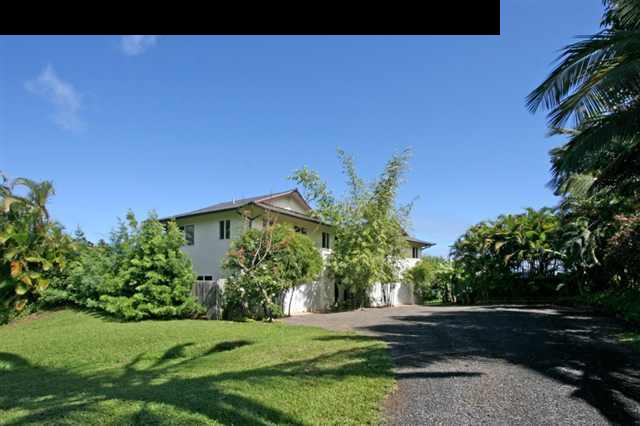 111 Door Of Faith Road Haiku, HI 96708 - Photo 22 of 23 a view of a street with a building in the background