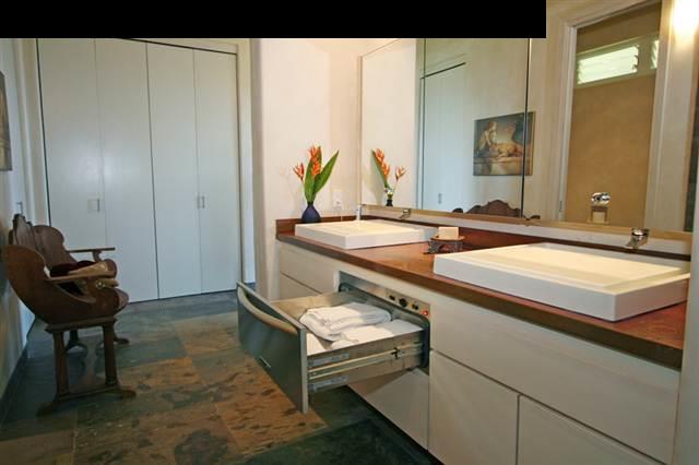 111 Door Of Faith Road Haiku, HI 96708 - Photo 9 of 23 a bathroom with a sink and a mirror