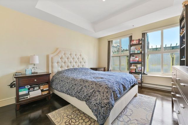 a bathroom with a shower sink and mirror