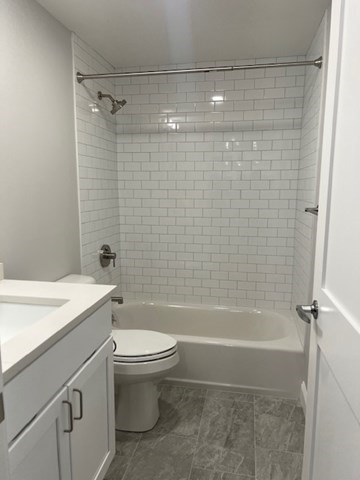 328 Bank, Unit 4 Harwich, MA 02645 - Photo 6 of 6 a bathroom with a shower a toilet and sink