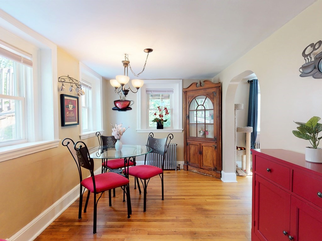 54 Carlin Road Waltham, MA 02451 - Photo 7 of 41 a view of a dining room with furniture and window