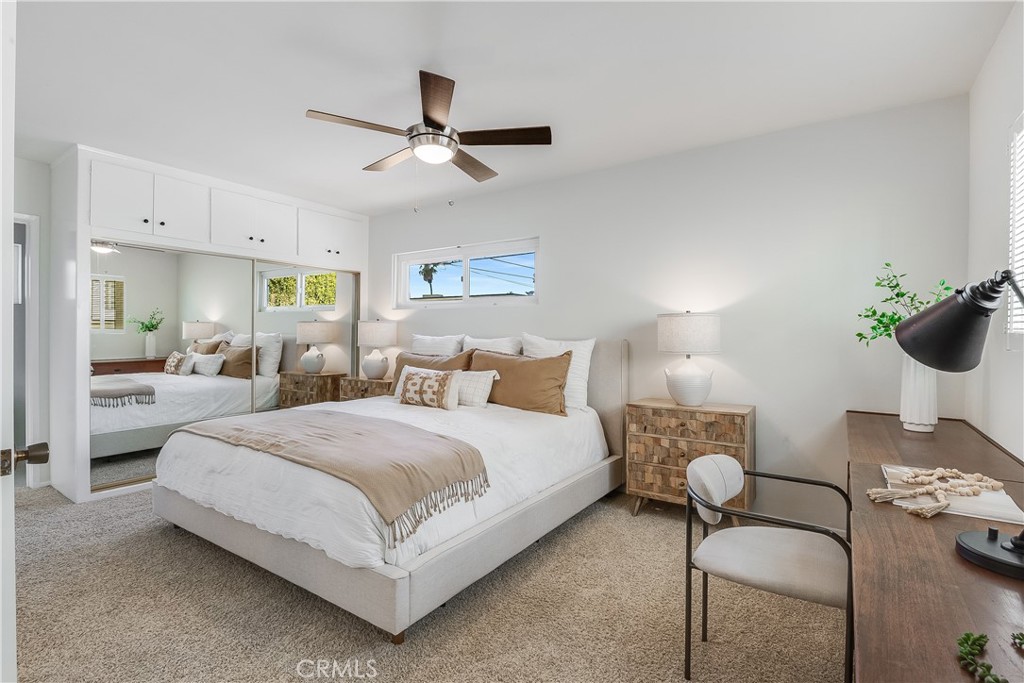 214 Angelo Walk Long Beach, CA 90803 - Photo 18 of 36 a bedroom with a bed and window