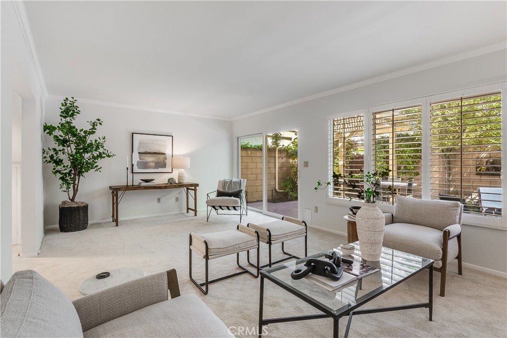 214 Angelo Walk Long Beach, CA 90803 - Photo 5 of 36 Gorgeous living room opens to large backyard patio.