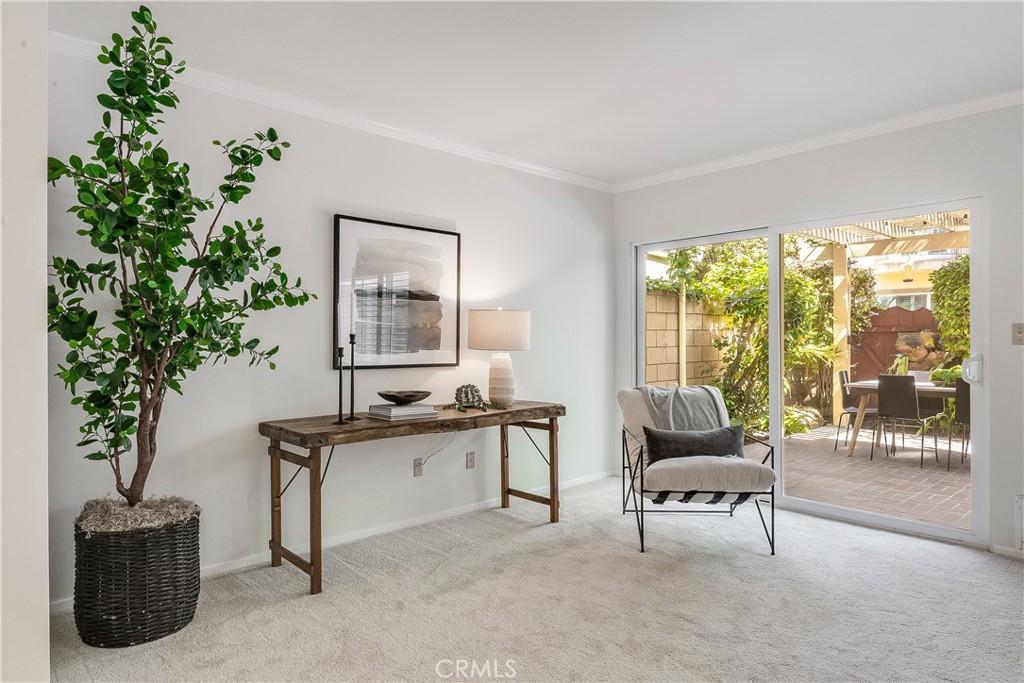 214 Angelo Walk Long Beach, CA 90803 - Photo 6 of 36 a living room with furniture and a potted plant