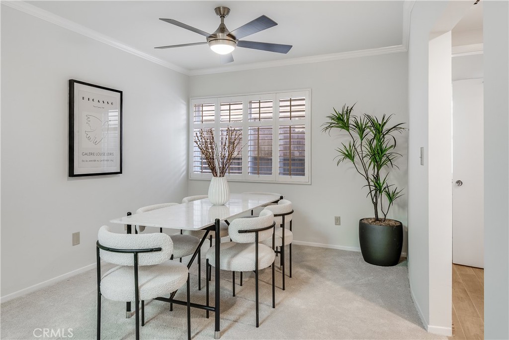 214 Angelo Walk Long Beach, CA 90803 - Photo 9 of 36 a view of a workspace with furniture and a potted plant