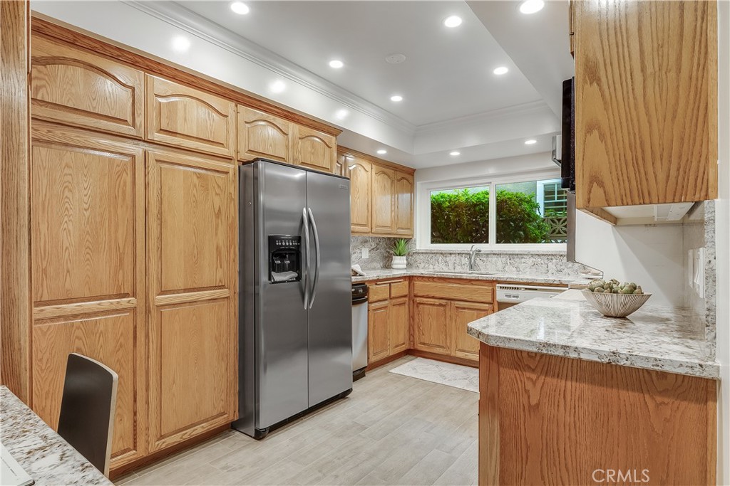 214 Angelo Walk Long Beach, CA 90803 - Photo 10 of 36 Lovingly maintained kitchen with beautiful picture window.