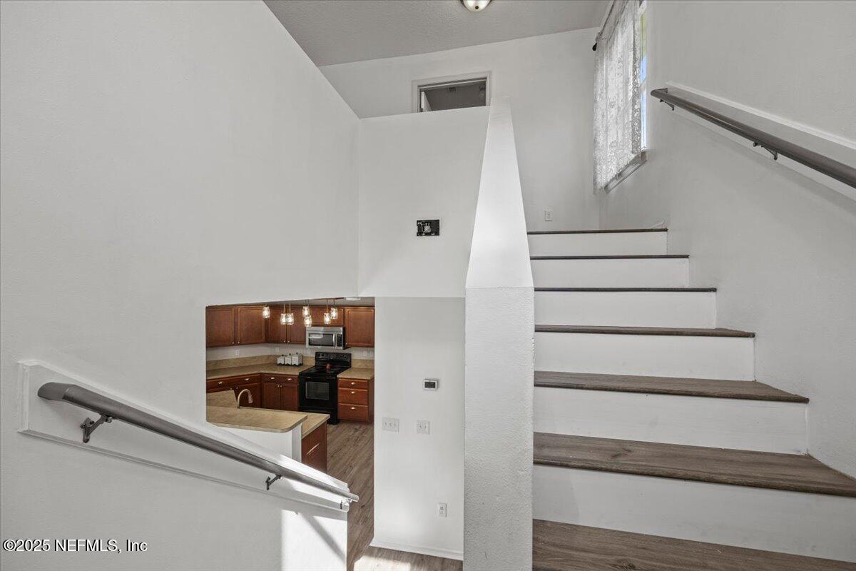 77347 Cobblestone Drive Yulee, FL 32097 - Photo 18 of 35 a view of entryway and workspace