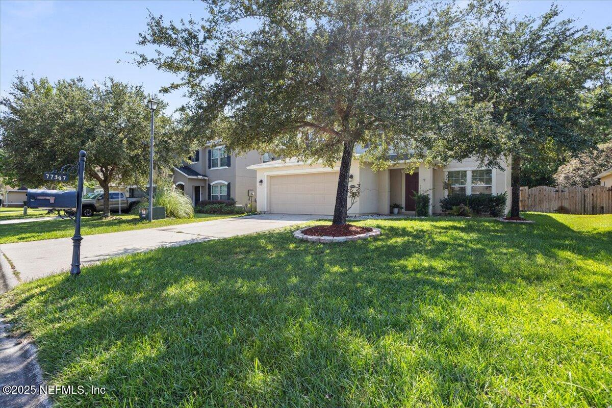77347 Cobblestone Drive Yulee, FL 32097 - Photo 3 of 35 a garden view