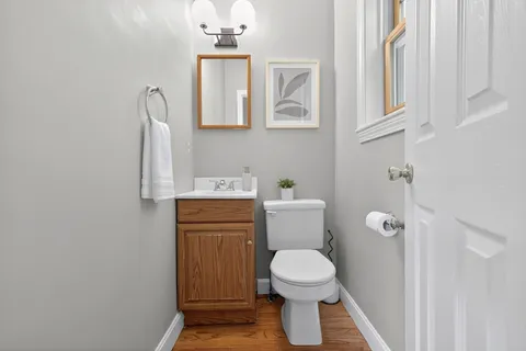 a bathroom with a toilet and a sink