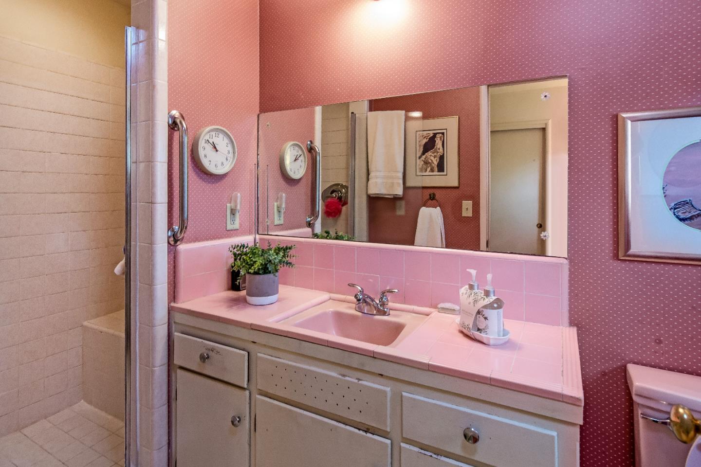 19030 Brookview Drive Saratoga, CA 95070 - Photo 17 of 22 a bathroom with a sink and a mirror