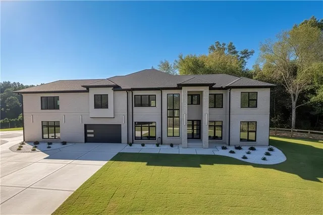 a front view of a house with swimming pool