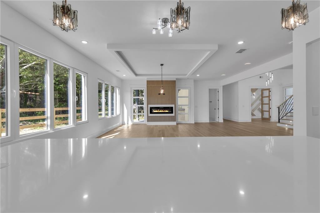 1939 Sunny Hill Road Lawrenceville, GA 30043 - Photo 17 of 47 a living room with furniture and a large window