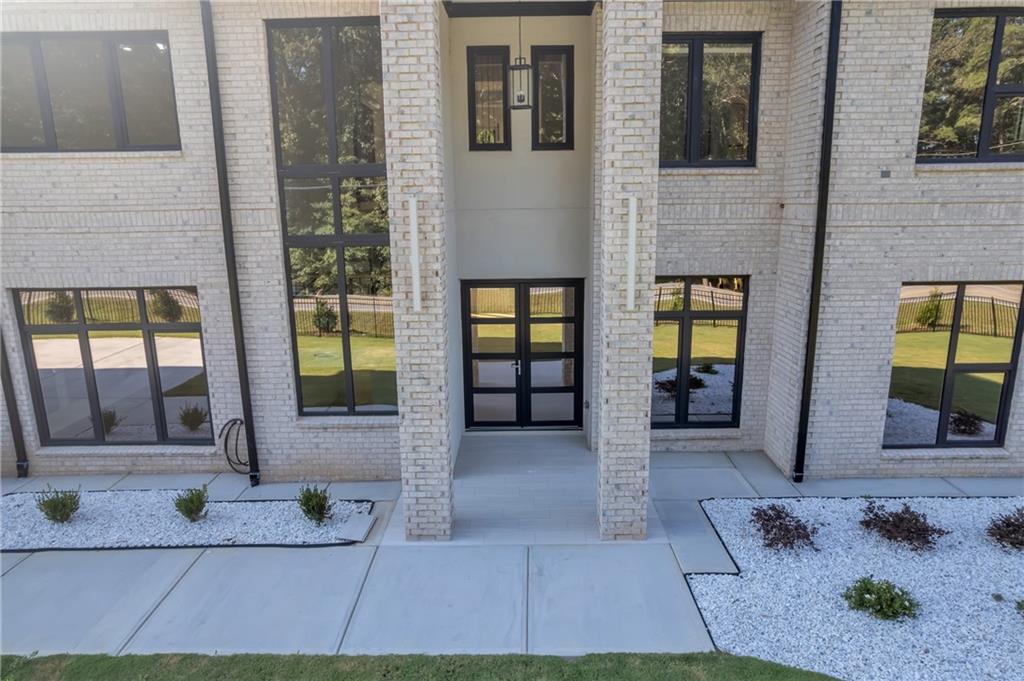 1939 Sunny Hill Road Lawrenceville, GA 30043 - Photo 2 of 47 a view of a entryway of a house