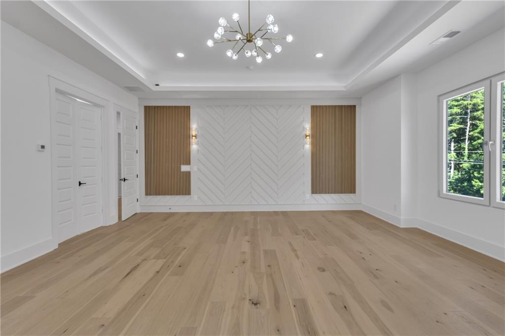 1939 Sunny Hill Road Lawrenceville, GA 30043 - Photo 28 of 47 a view of an empty room with glass door and a window