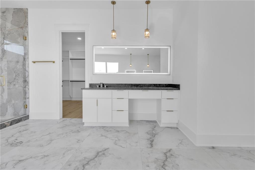 1939 Sunny Hill Road Lawrenceville, GA 30043 - Photo 34 of 47 a view of cabinets and window