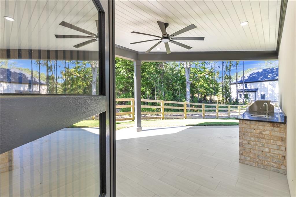 1939 Sunny Hill Road Lawrenceville, GA 30043 - Photo 38 of 47 a view of a living room and a window