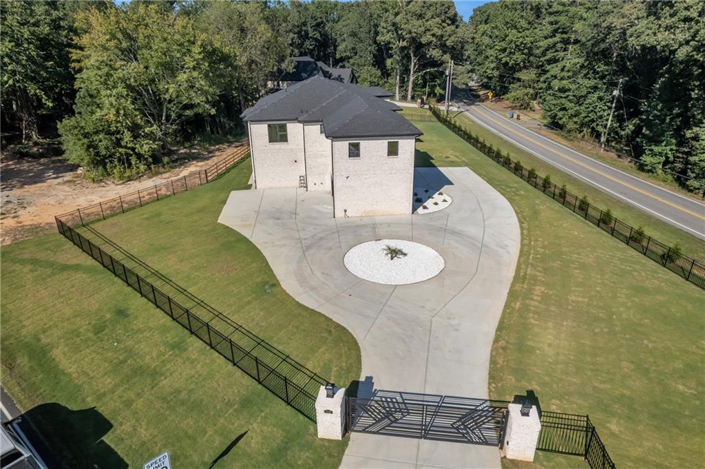 1939 Sunny Hill Road Lawrenceville, GA 30043 - Photo 40 of 47 a view of a house with pool